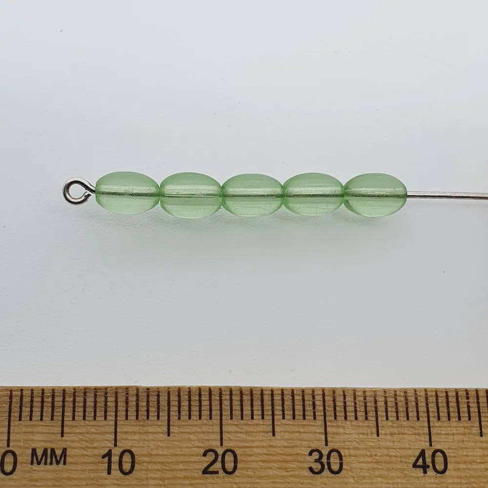 7x4mm Rice (100) - Transparent Peridot Green - Glass Bead