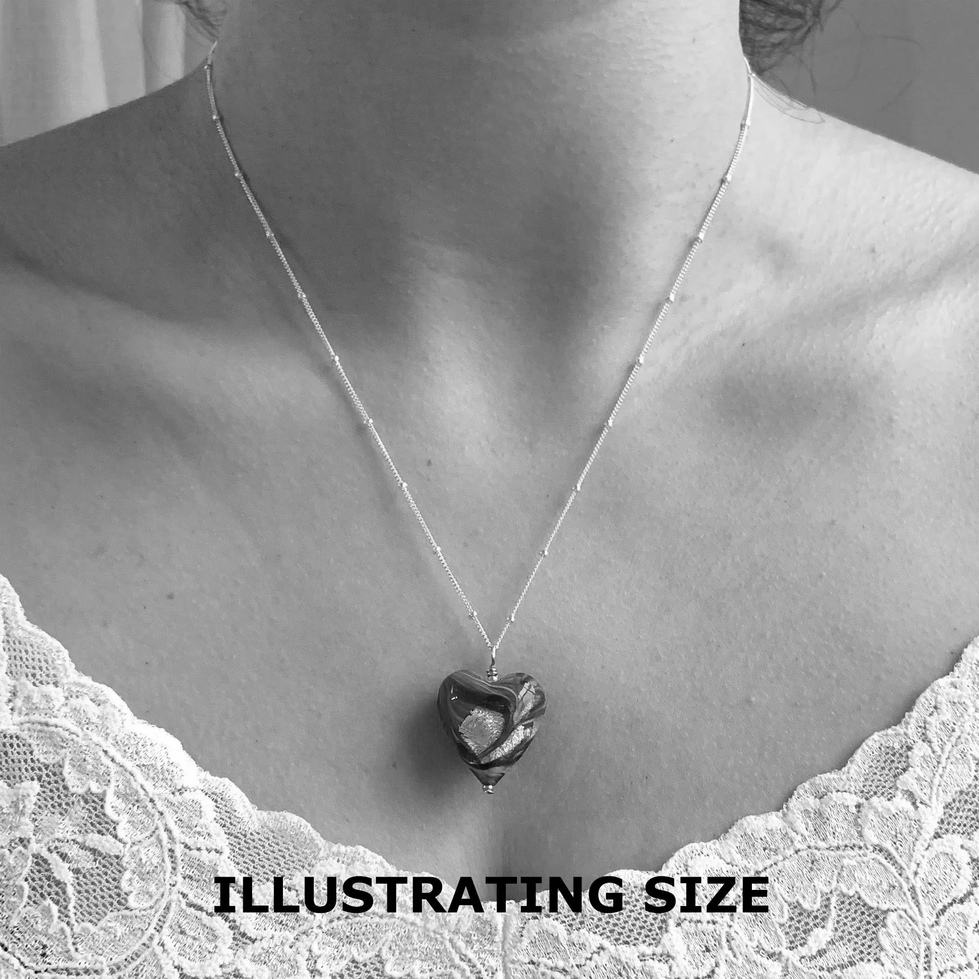 Necklace with purple pastel Murano glass medium heart pendant on silver chain