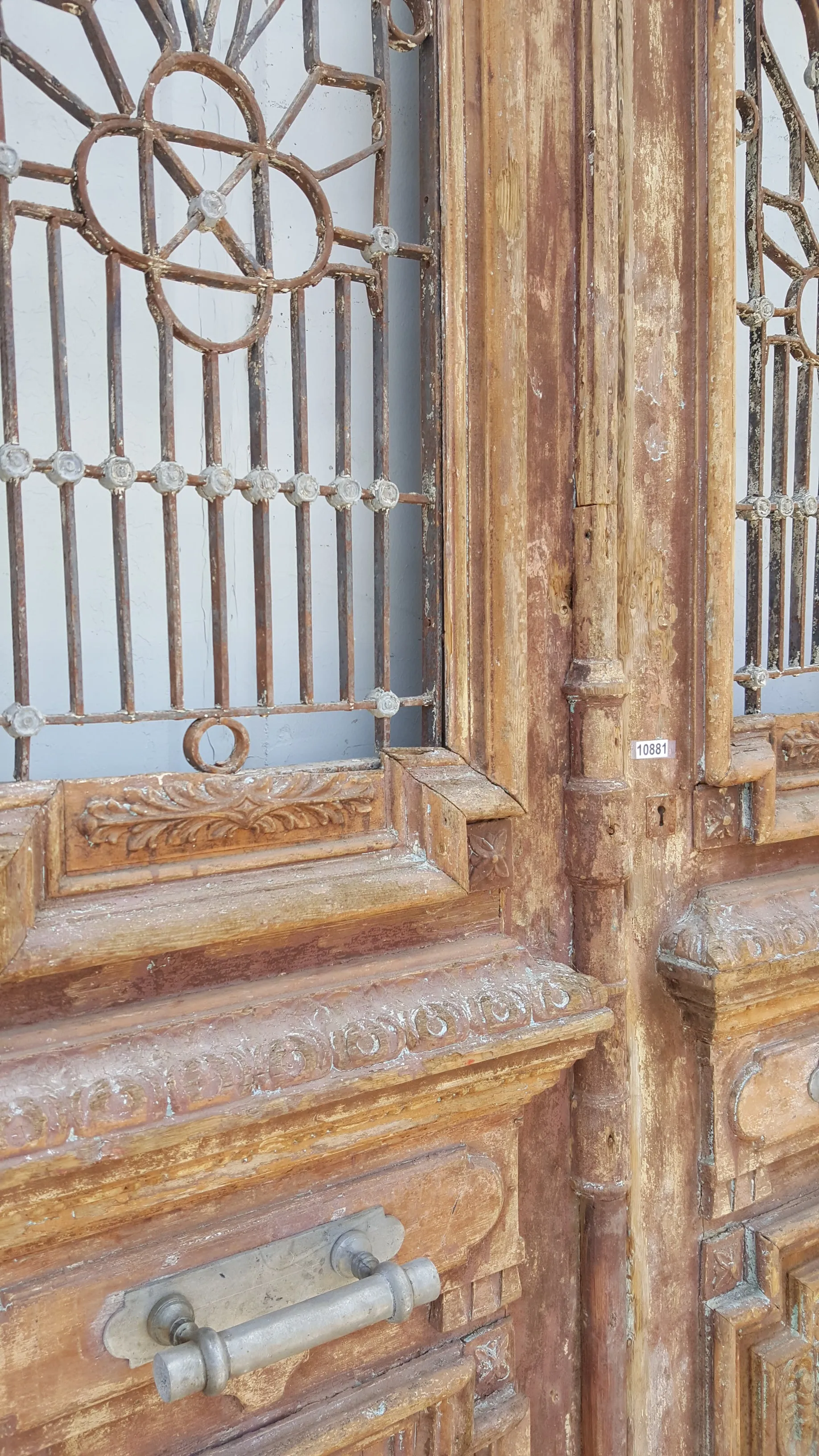 Pair of Ornate Wood Antique Carved Doors with Iron Inserts (no glass)
