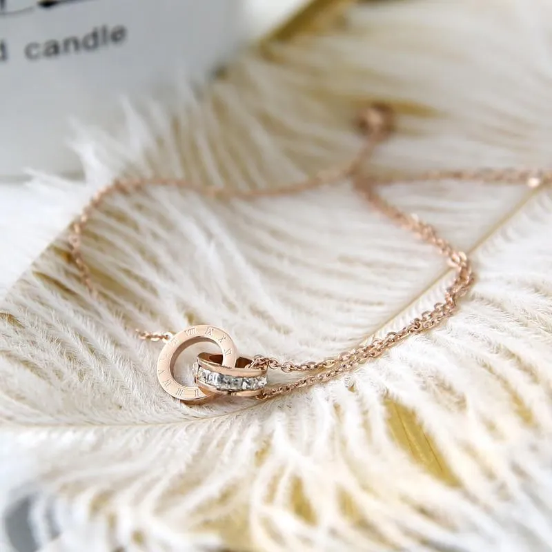 Rose Gold Bracelet With Diamonds And Roman Numerals